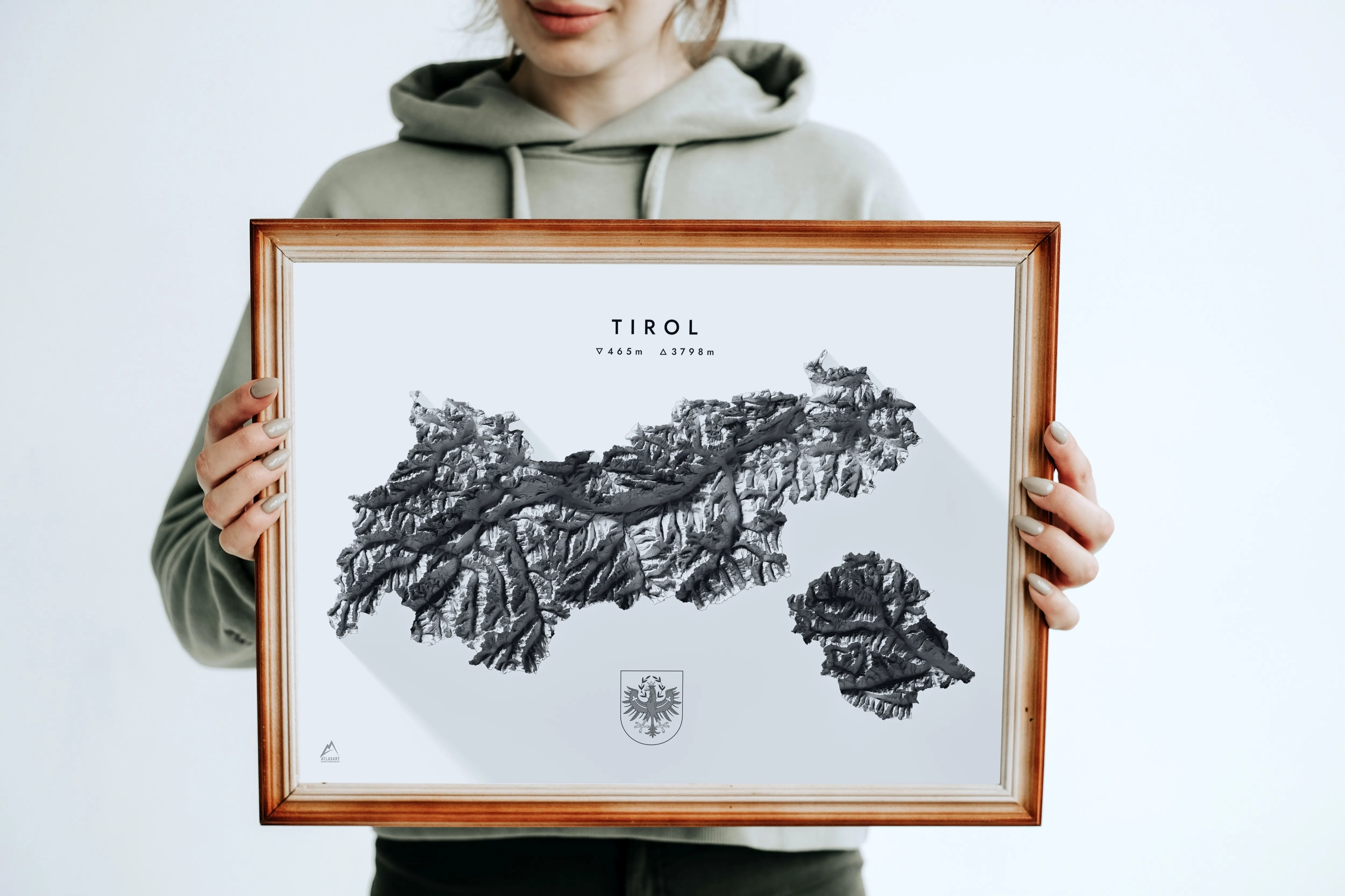 Framed Atlas Art print of Tirol held up against a neutral background, showing scale and finish